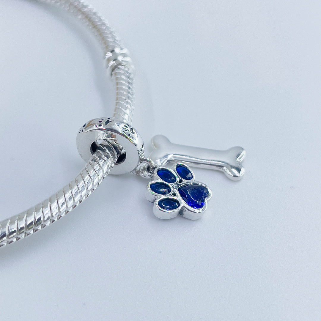 Charm Huellita Azul