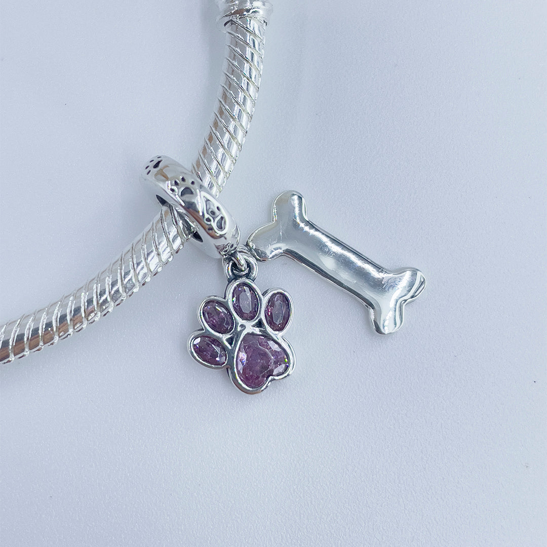 Charm Huellita Rosa